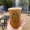 a person holding a cup of coffee